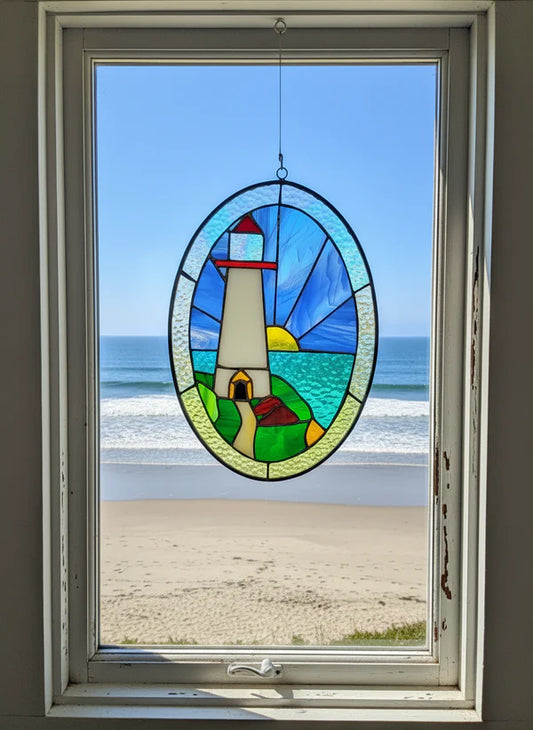 Stained Glass Lighthouse Ocean Sun and Sky